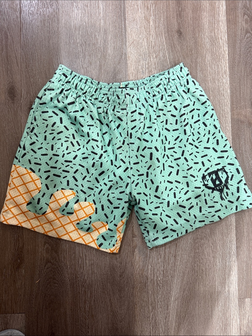 Kids Mint Green Patterned Shorts with Orange Accent